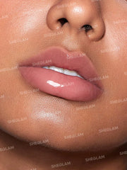 Sheglam- JELLY WOW HYDRATING LIP OIL-MALI-BLUE BERRY - The Beauty League Pakistan