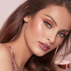 Charlotte Tilbury Beauty Highlighter Wand- Pillow Talk - The Beauty League Pakistan